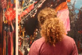 Student looking at art during an NDatUT event