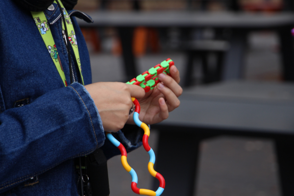 A person uses a fidget toy